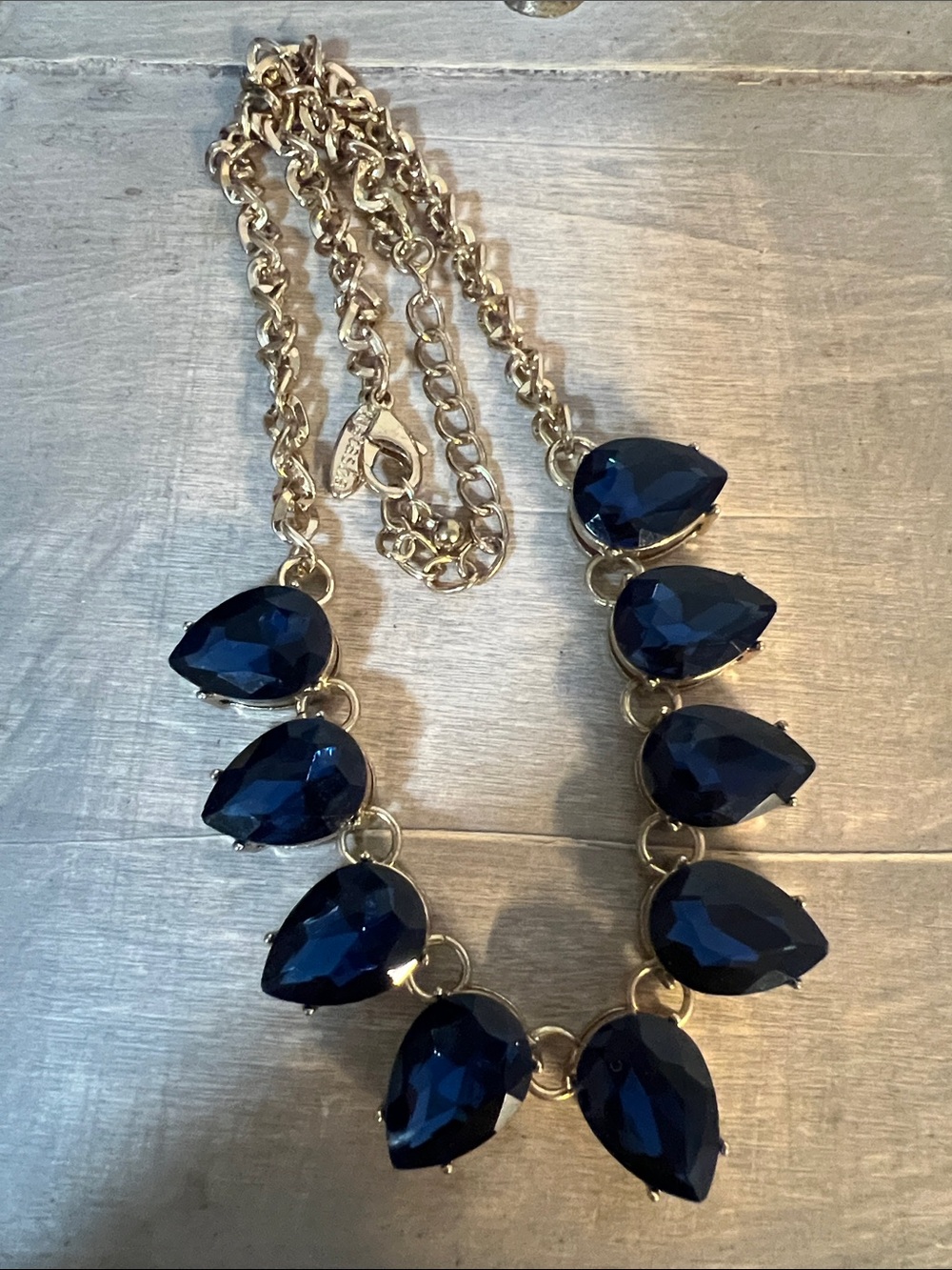 Gold-Tone Necklace with Deep Navy Teardrop Stones